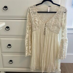 Xhilaration dress. Only worn a few times. Lace top and lace bell sleeves.